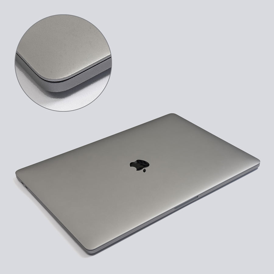 Macbook Pro i utmärkt skick. Visar ett chassi med minimalt slitage